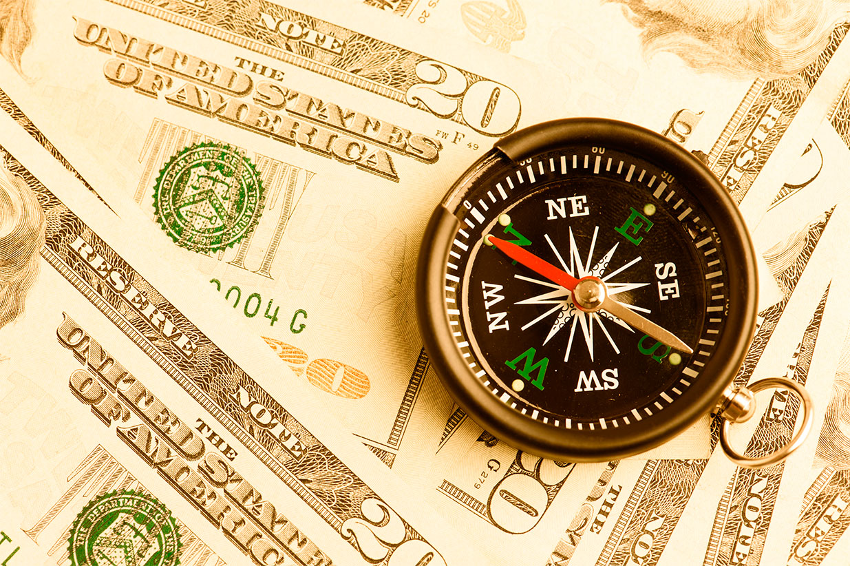 Cash with a compass on it
