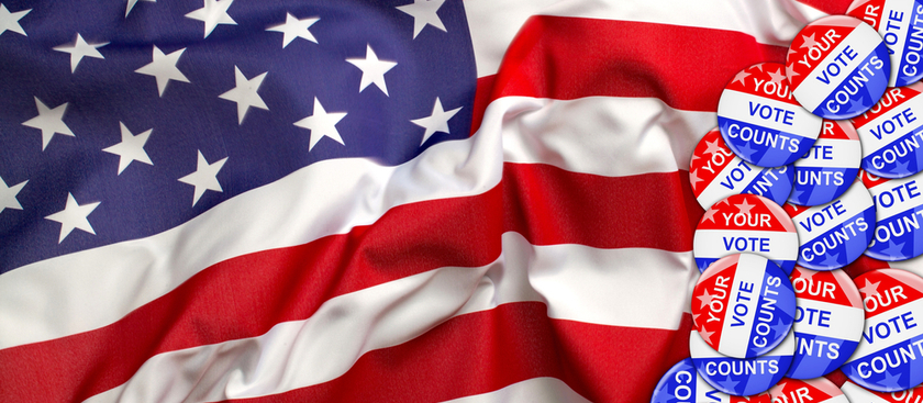 American Flag with Your vote count pins on it