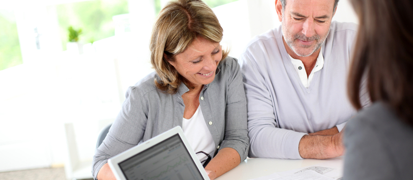 Senior couple having a meeting with financial advisor