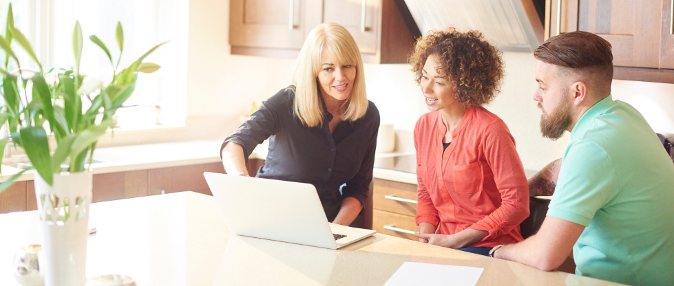 Couple meeting with real estate agent