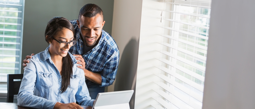 Couple looking over budgeting together