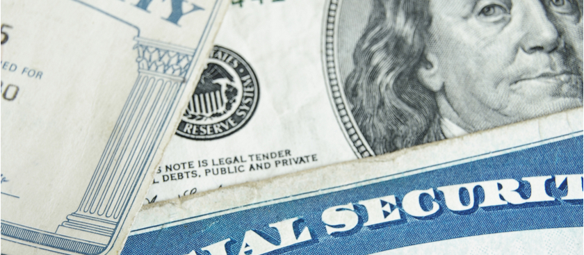 Social security card with dollar bills in the background