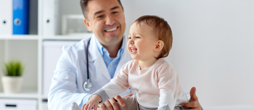 Doctor visiting with baby patient