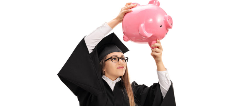 Graduate student holding piggy bank upside down