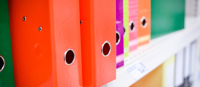 Binders on shelf
