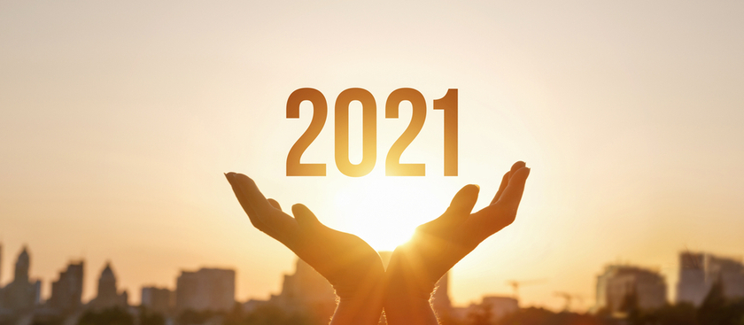 Hands with palms facing up and 2021 in the palms