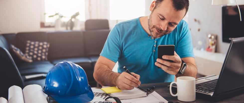 Man sitting at desk in Jacksonville looking over paperwork