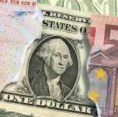 Dollar Bill with a euro beside it