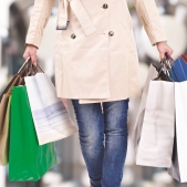 Lady carrying shopping bags for holiday season