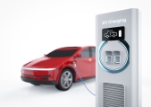 Electric car charging at a station
